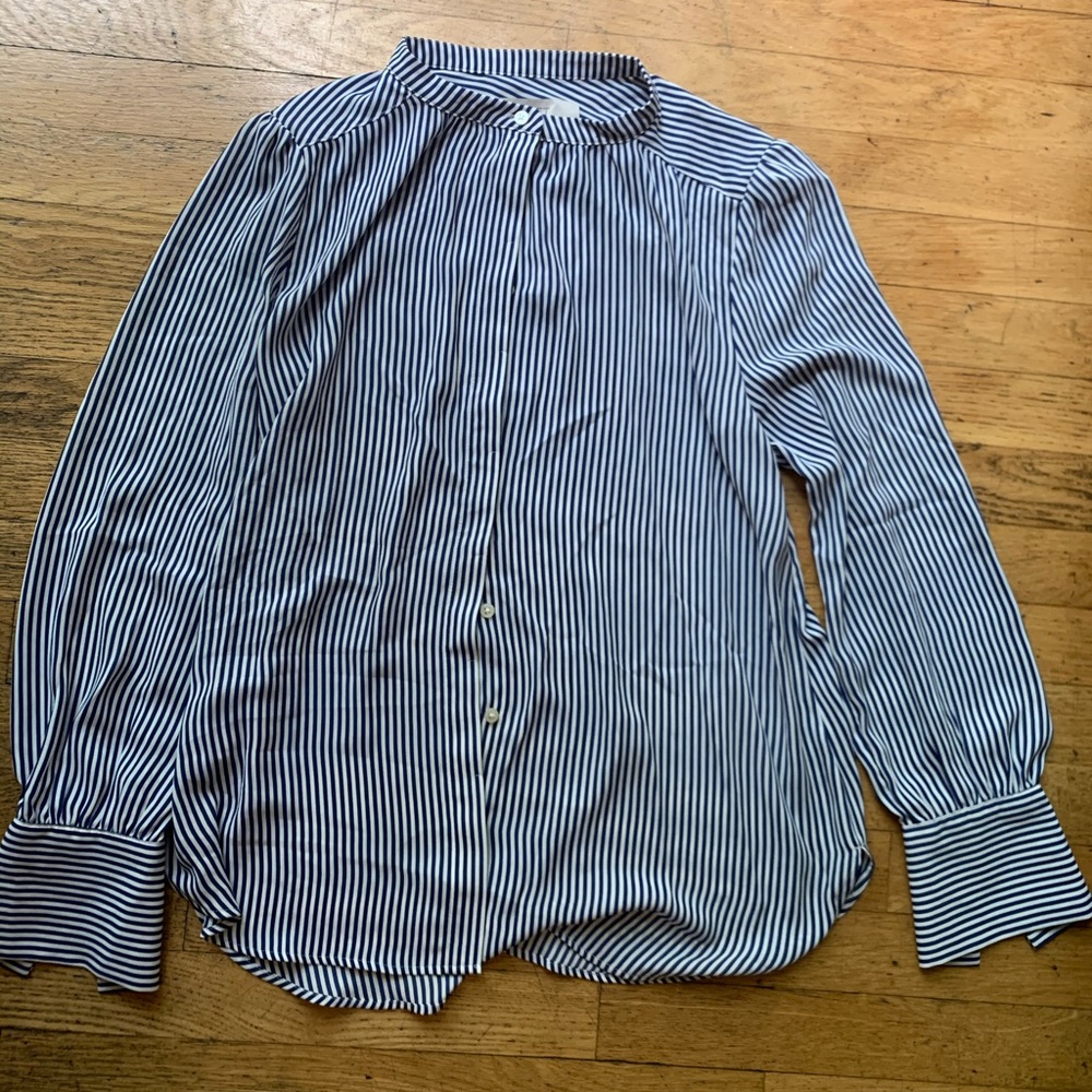 Women’s blue button down shirt